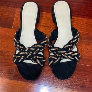 Black and gold sandals